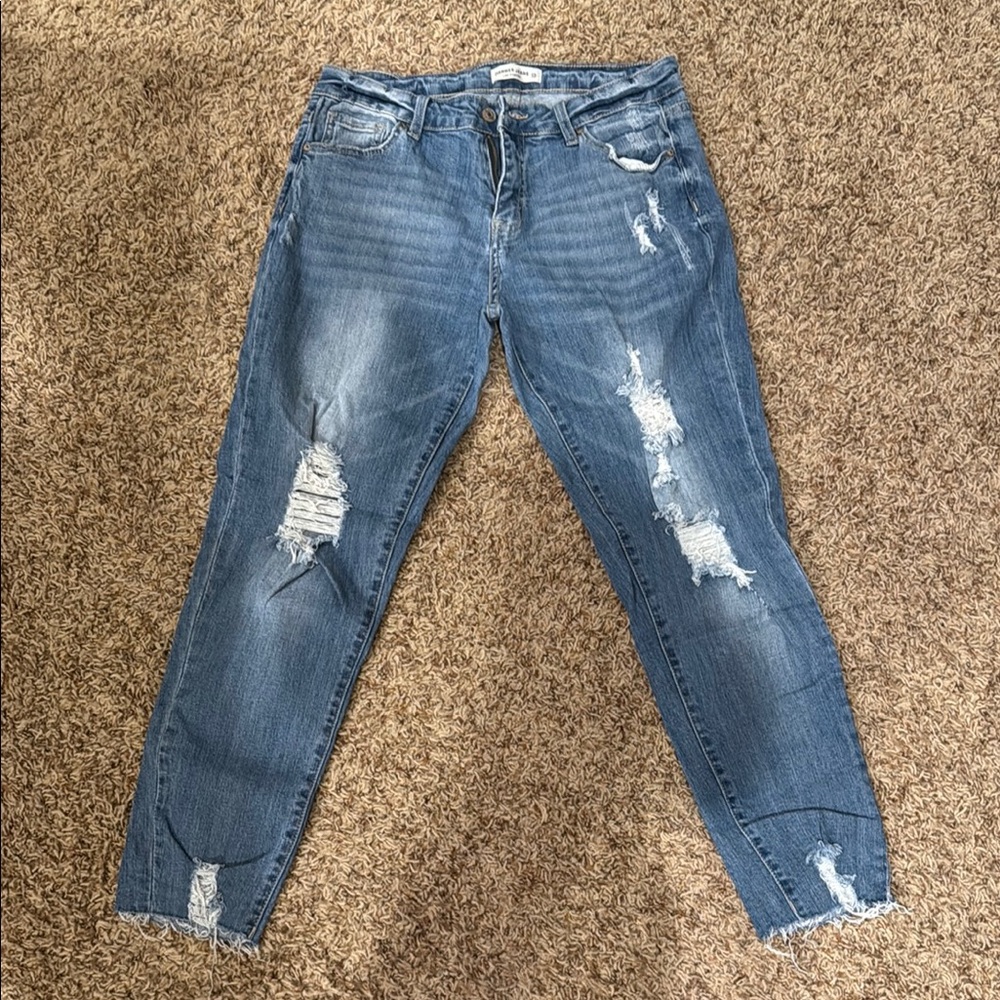 Distressed Blue Boyfriend Jeans with Raw Hem